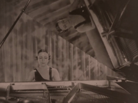 Music - Young Girl in a Garden (1922).mp4.2.gif