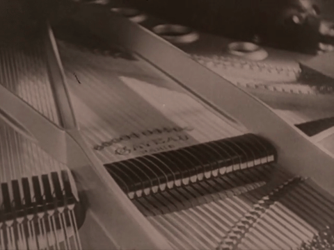 Music - Young Girl in a Garden (1922).mp4.3.gif