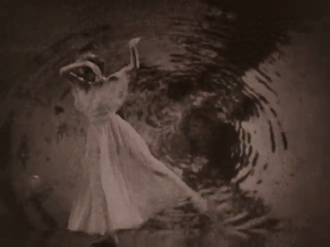 Music - Young Girl in a Garden (1922).mp4.7.gif