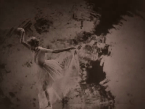 Music - Young Girl in a Garden (1922).mp4.8.gif