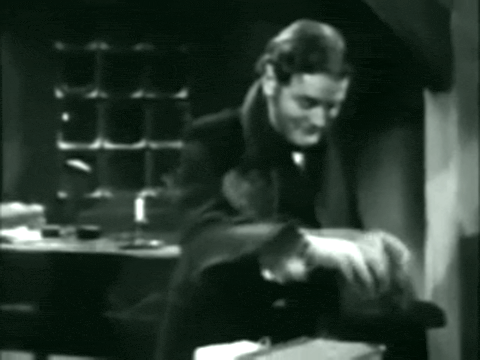 The Christmas Carol as told by Vincent Price (1949).mp4.2.gif
